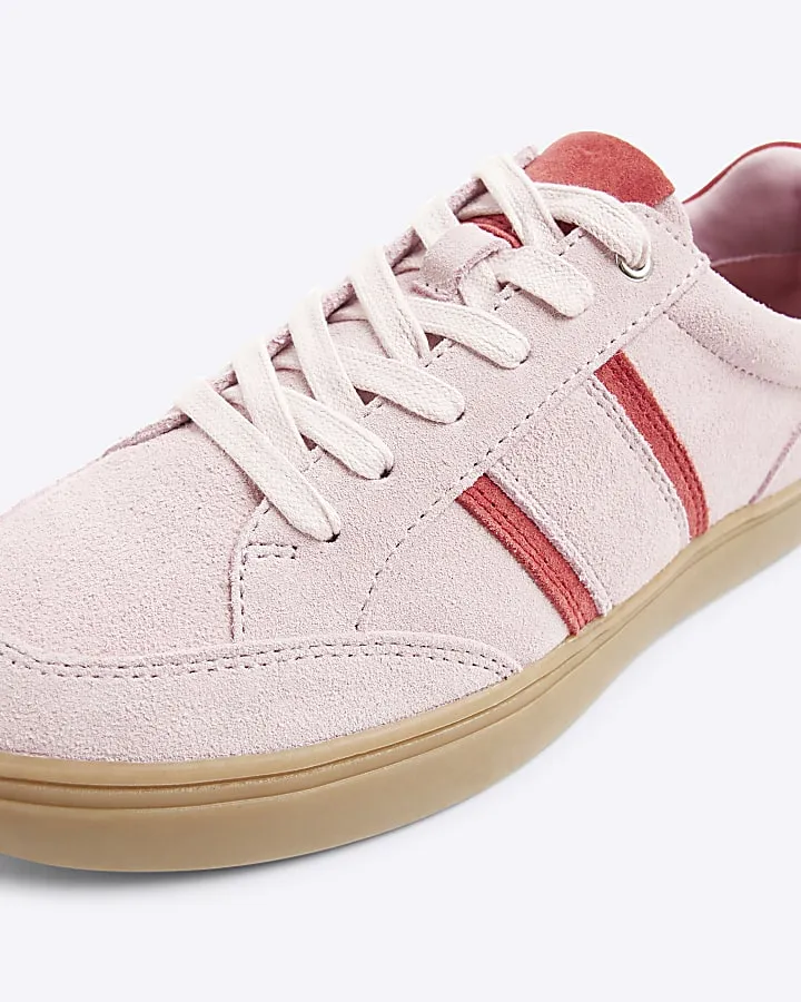 Pink suede lace up trainers