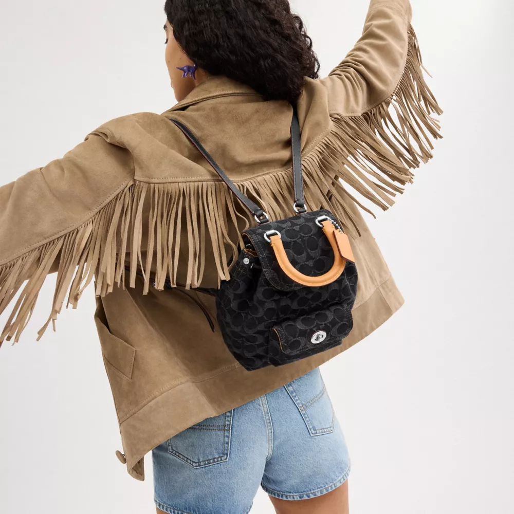 RIYA BACKPACK 21 IN SIGNATURE DENIM